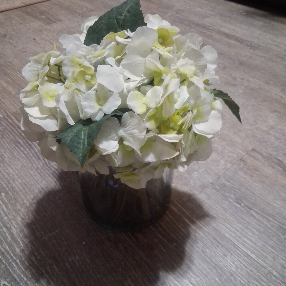 lifelike cream-white artificial silk hydrangea floral arrangement.